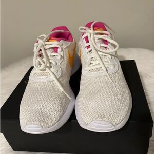 Nike White Sneakers with Pink and Yellow Accents
